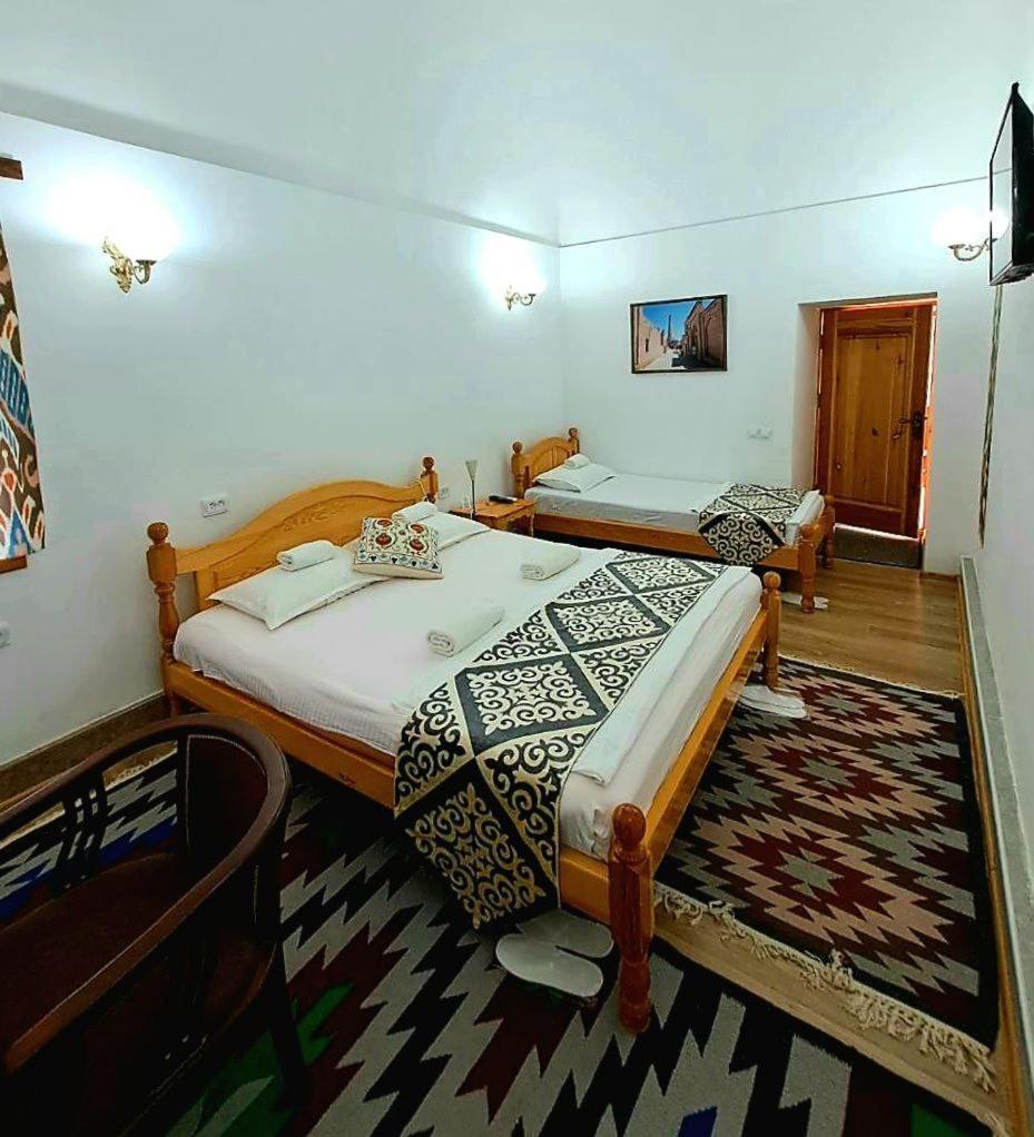חיווה Madrasah Polvon-Qori Boutique Hotel XIX Century מראה חיצוני תמונה